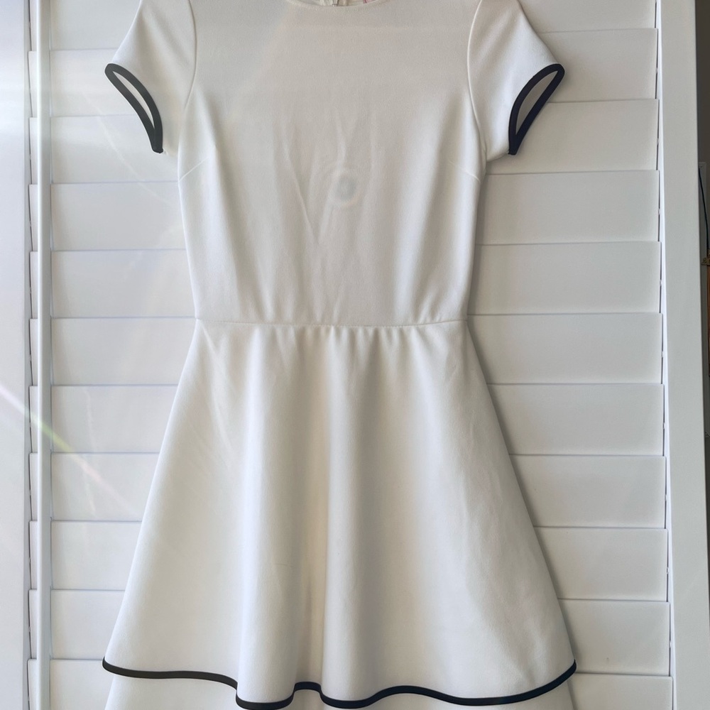 Elegant White Dress with Black Trim